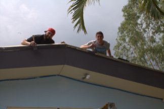 Josh and Tyler painting on the roof at the San Salvador church.
